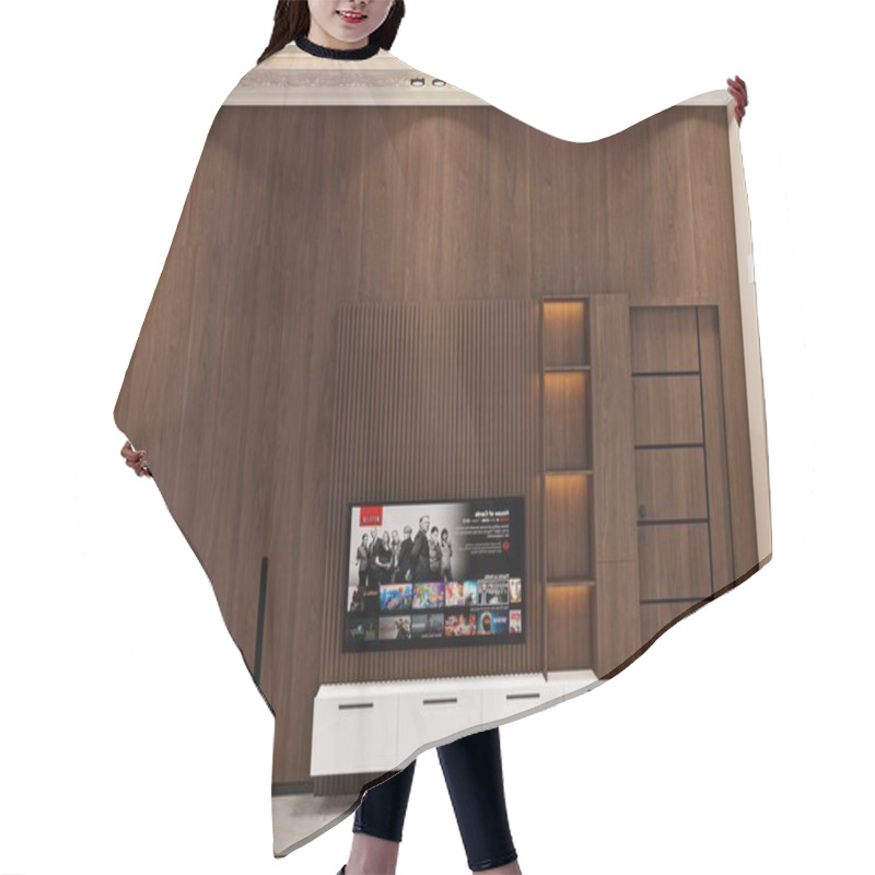 Personality  Warm And Welcoming Minimalist Entertainment Area With Wooden Accents Minimalist Entertainment Wall With Warm Wooden Elements And Modern TV Hair Cutting Cape