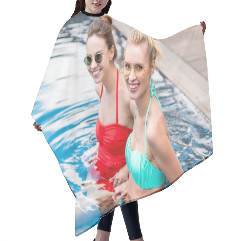 Personality  Smiling Young Women Sitting In Swimming Pool And Looking At Camera Hair Cutting Cape