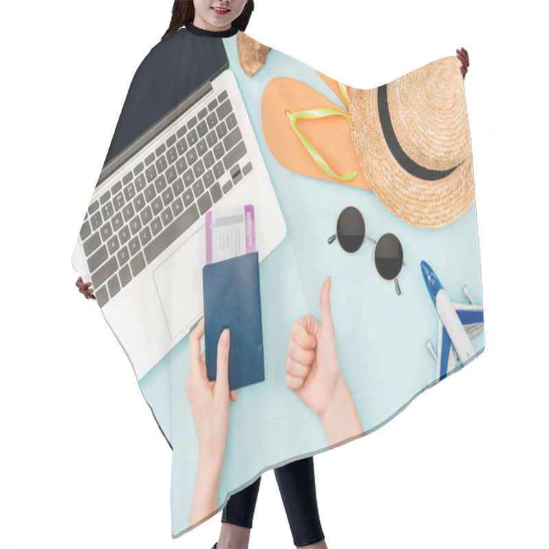 Personality  Cropped View Of Woman Holding Passports And Air Tickets While Doing Thumb Up Gesture Near Laptop, Earphones, Sunglasses, Seashells, Flip Flops, Toy Plane And Straw Hat On Blue Background Hair Cutting Cape