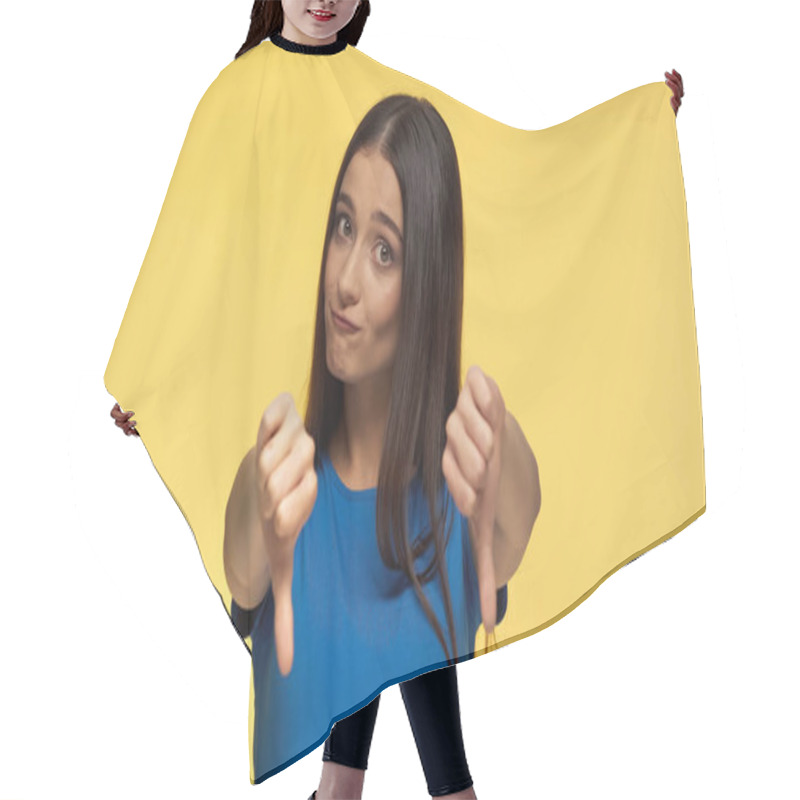 Personality  Young Brunette Woman In Blue T-shirt Showing Dislike And Biting Lip Isolated On Yellow Hair Cutting Cape