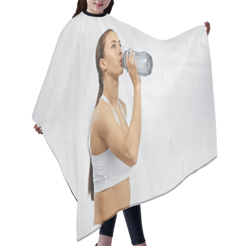 Personality  Sportswoman Drinking Water From Sports Bottle At Home  Hair Cutting Cape