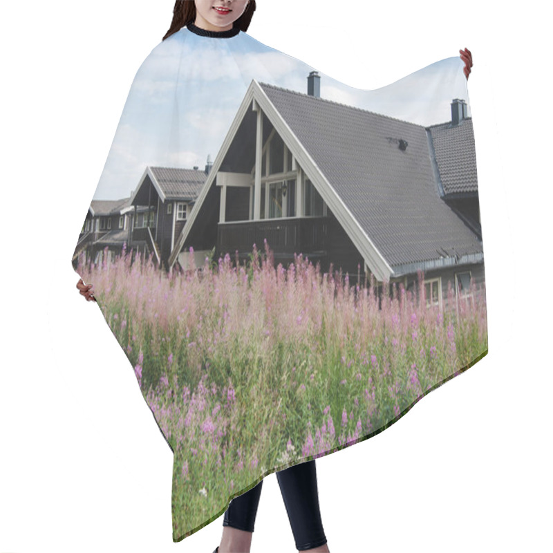 Personality  TRYSIL, NORWAY - 26 JULY 2018: Violet Lupine Flowers And Black Living Houses At Largest Ski Resort Trysil In Norway  Hair Cutting Cape