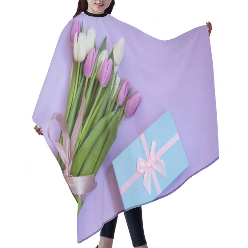 Personality  Bouquet Of Tulips With Gift Box On A Purple Background. Top View. Hair Cutting Cape