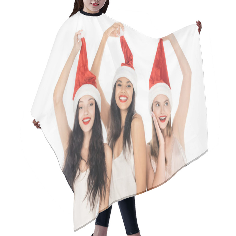 Personality  Positive Interracial Women Adjusting Santa Hats Isolated On White Hair Cutting Cape