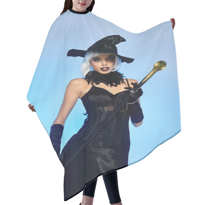 Personality  Dressed In A Stunning Witch Costume, A Young Woman Confidently Poses With A Stylish Wand. Hair Cutting Cape