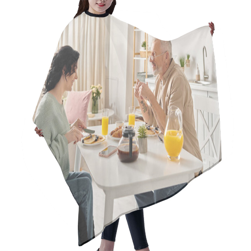 Personality  A Disabled Woman In A Wheelchair And Her Husband Share A Cozy Breakfast In Their Home Kitchen. Hair Cutting Cape