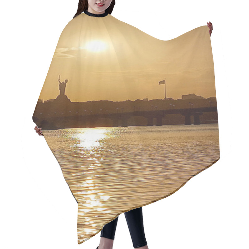 Personality  A Breathtaking Sunset Over Kyiv, Featuring The Iconic Motherland Monument And Ukrainian Flag Reflecting On The Calm River Waters. A Serene And Patriotic Scene With Golden Tones. Hair Cutting Cape