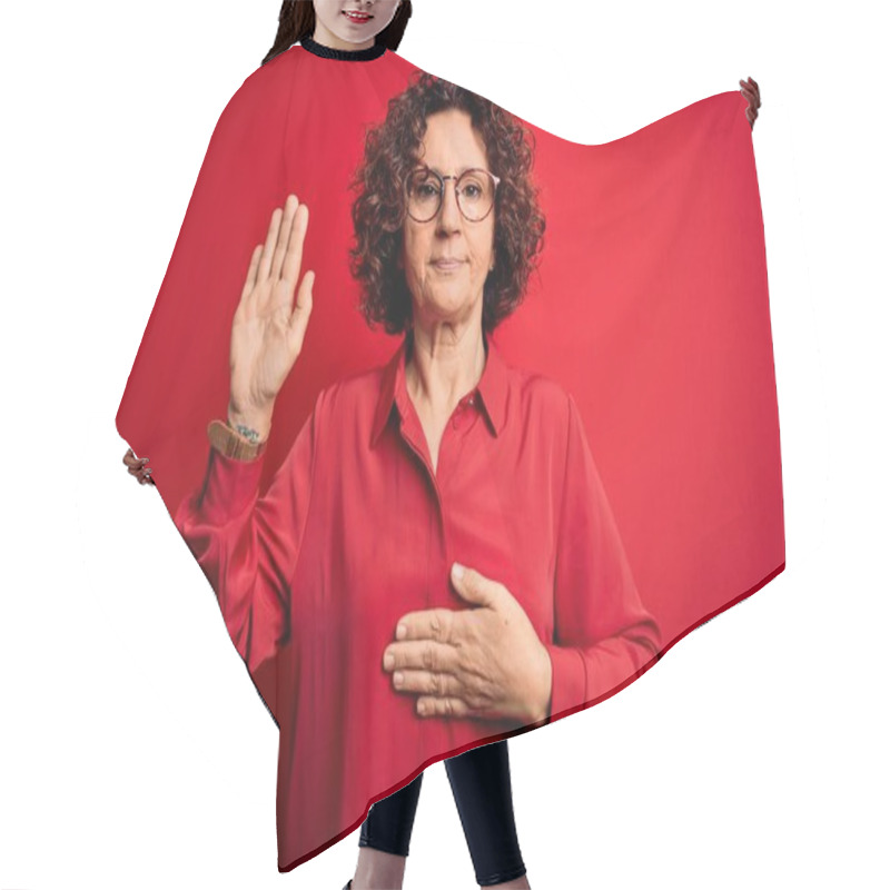 Personality  Middle Age Beautiful Curly Hair Woman Wearing Casual Shirt And Glasses Over Red Background Swearing With Hand On Chest And Open Palm, Making A Loyalty Promise Oath Hair Cutting Cape