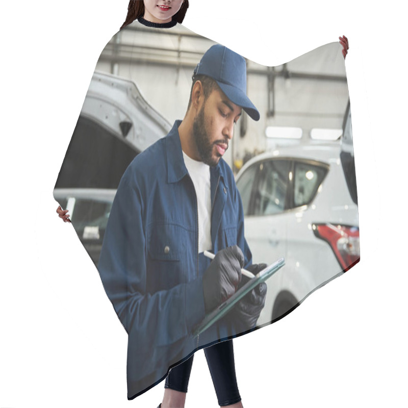 Personality  Young Mechanic Checks Vehicle Diagnostics With Focus In A Bustling Repair Shop Environment. Hair Cutting Cape