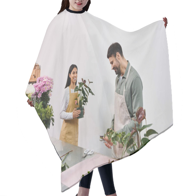 Personality  Couple Collaborates On Floral Arrangements While Managing Their Small Business In A Cozy Shop. Hair Cutting Cape