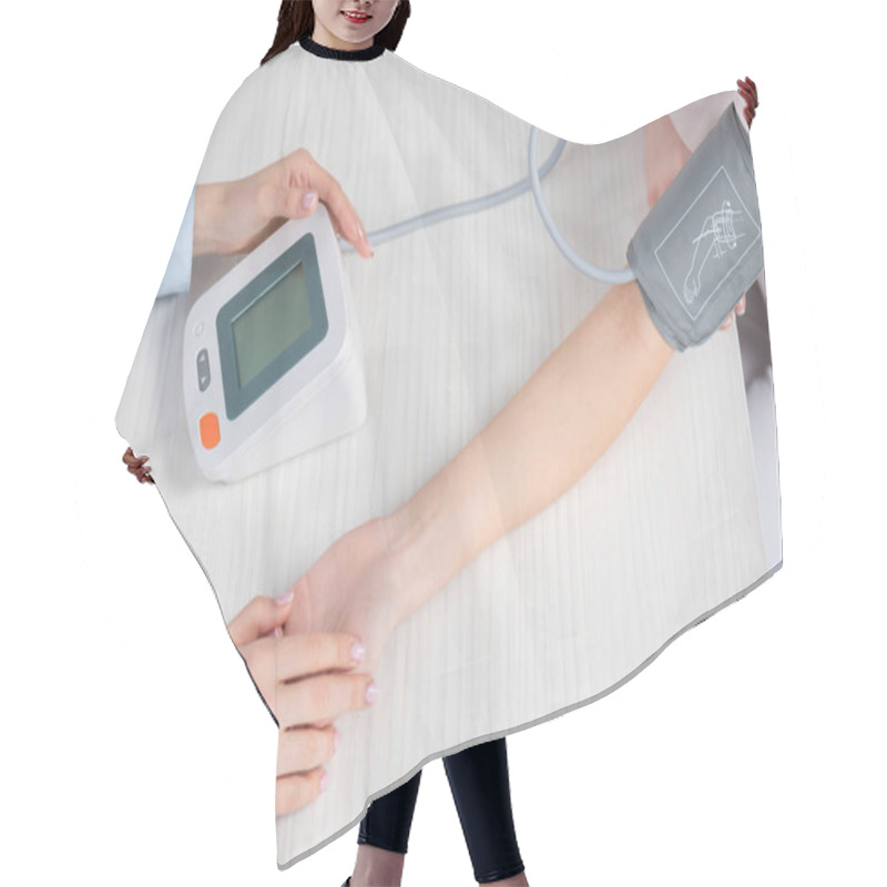 Personality  Doctor Measuring Blood Pressure To Patient Hair Cutting Cape