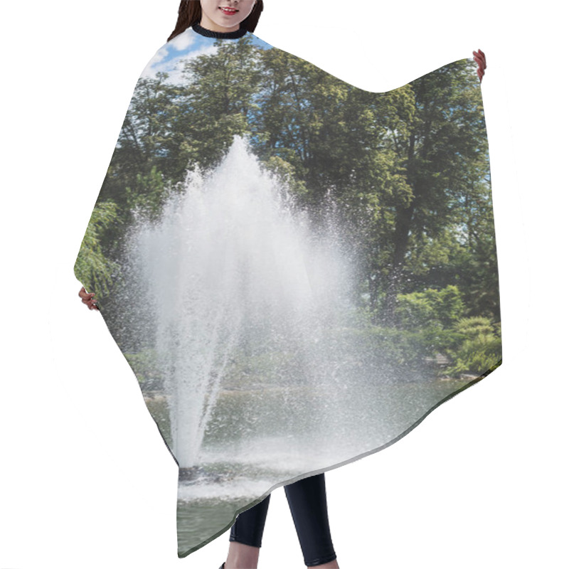 Personality  Water Splash And Drops Near Fountain In Pond Near Trees  Hair Cutting Cape