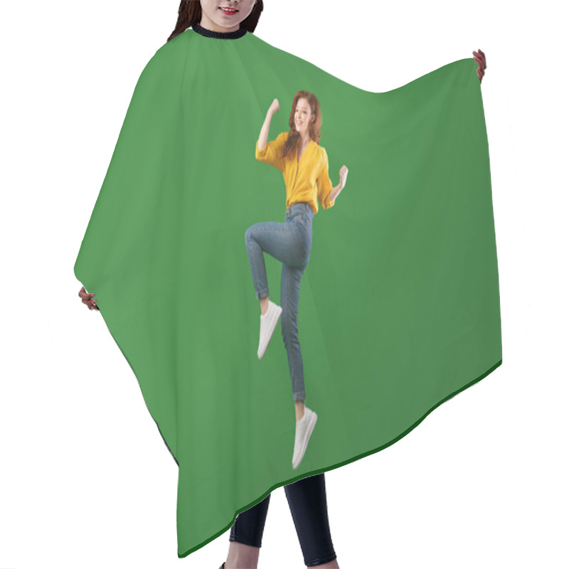 Personality  Happy Millennial Girl Jumping Shaking Fists, Studio Shot Hair Cutting Cape