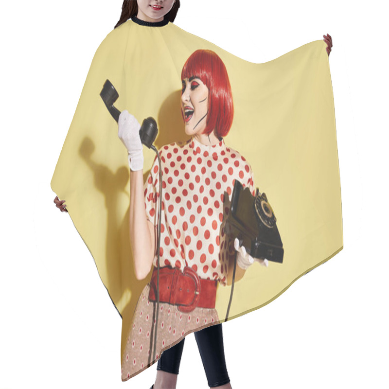 Personality  A Fiery Red-haired Woman With Striking Pop Art Makeup Holds A Phone Against A Yellow Background, Channeling A Comic Book Character. Hair Cutting Cape