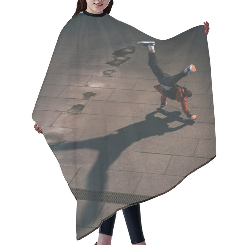 Personality  High Angle View Of Skateboarder Riding Upside Down On Hands Hair Cutting Cape