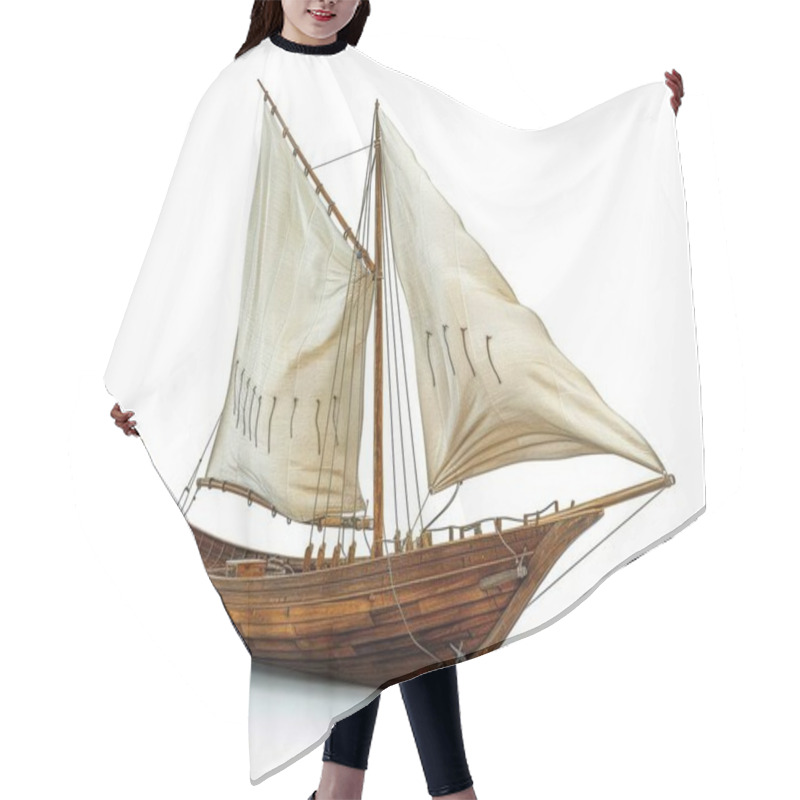 Personality  A Beautifully Crafted Wooden Sailboat Model With White Sails, Showcasing Intricate Details And Craftsmanship. Hair Cutting Cape