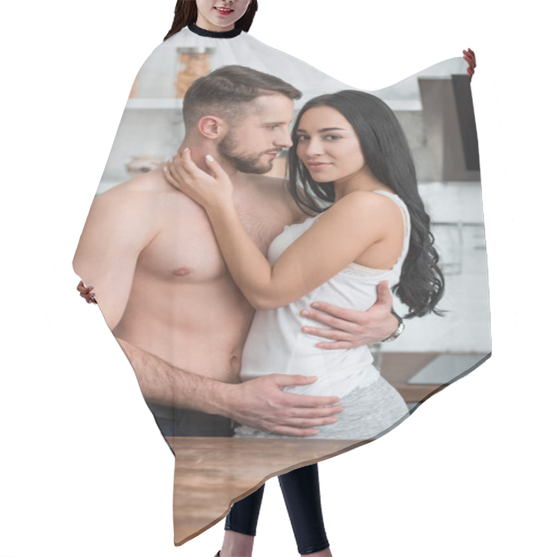 Personality  Attractive Brunette Woman Hugging Muscular And Handsome Boyfriend In Kitchen  Hair Cutting Cape