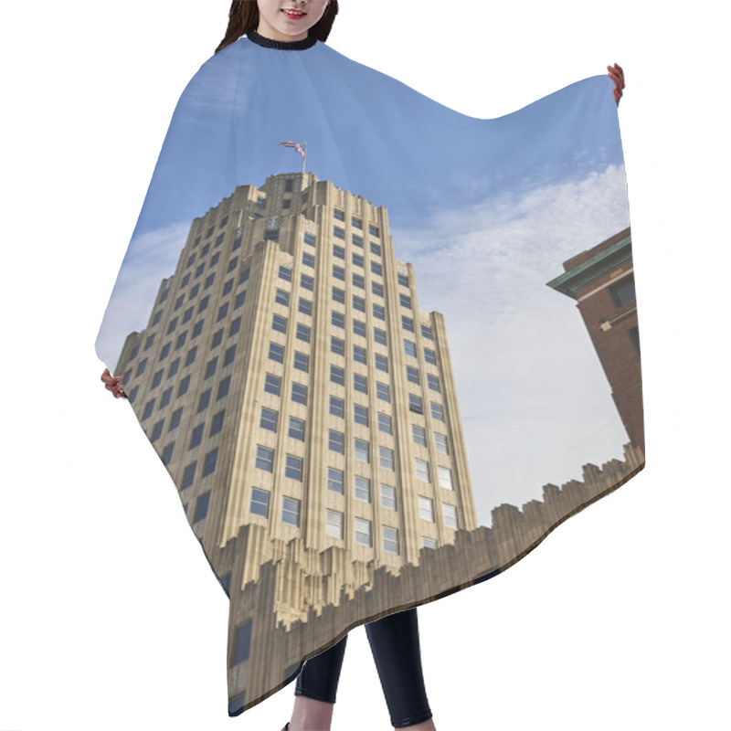 Personality  Art Deco Architectural Grandeur Of The Lincoln Tower Under Clear Blue Skies In Downtown Fort Wayne, Indiana, With A Flying American Flag Hair Cutting Cape