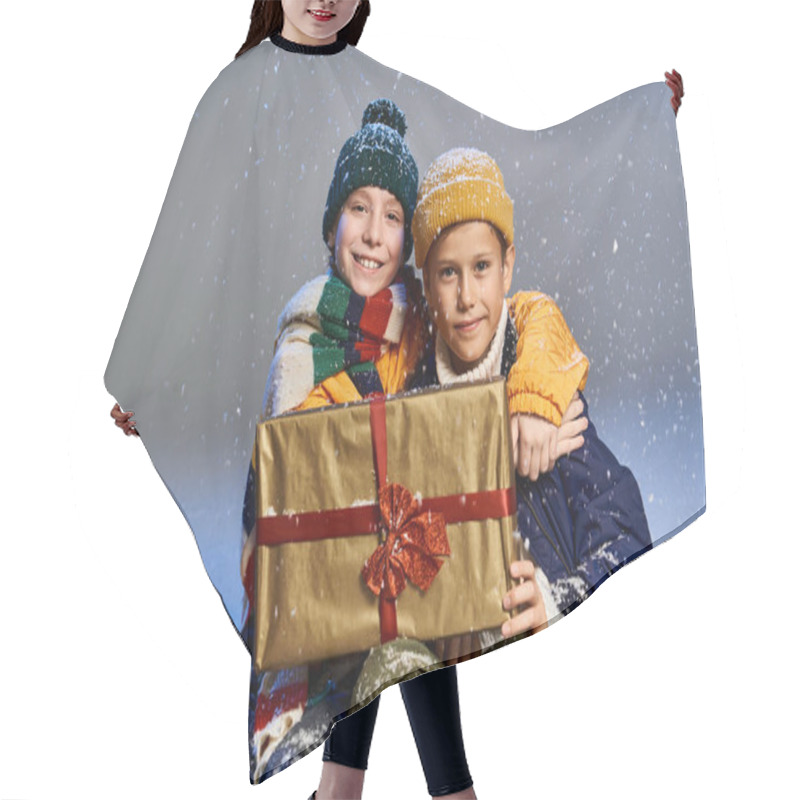 Personality  In A Cozy Winter Setting, Two Happy Kids Embrace While Surrounded By Festive Gifts. Hair Cutting Cape