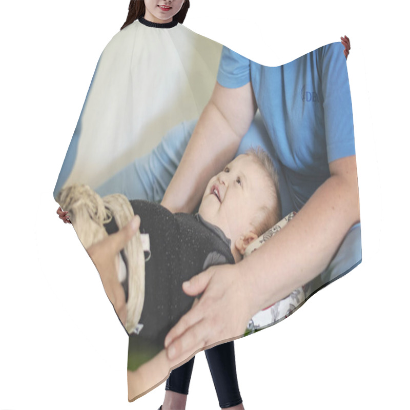 Personality  Portrait Of A Baby With Cerebral Palsy On Physiotherapy Hair Cutting Cape