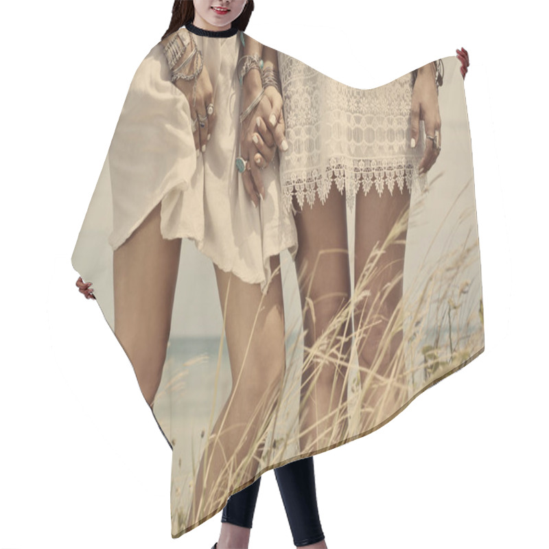 Personality  Cropped Image Of Two Bohemian Women Hair Cutting Cape