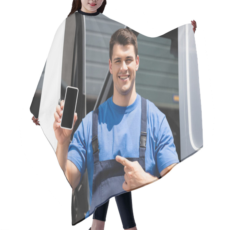 Personality  Loader Pointing With Finger At Smartphone With Blank Screen Near Truck Outdoors  Hair Cutting Cape