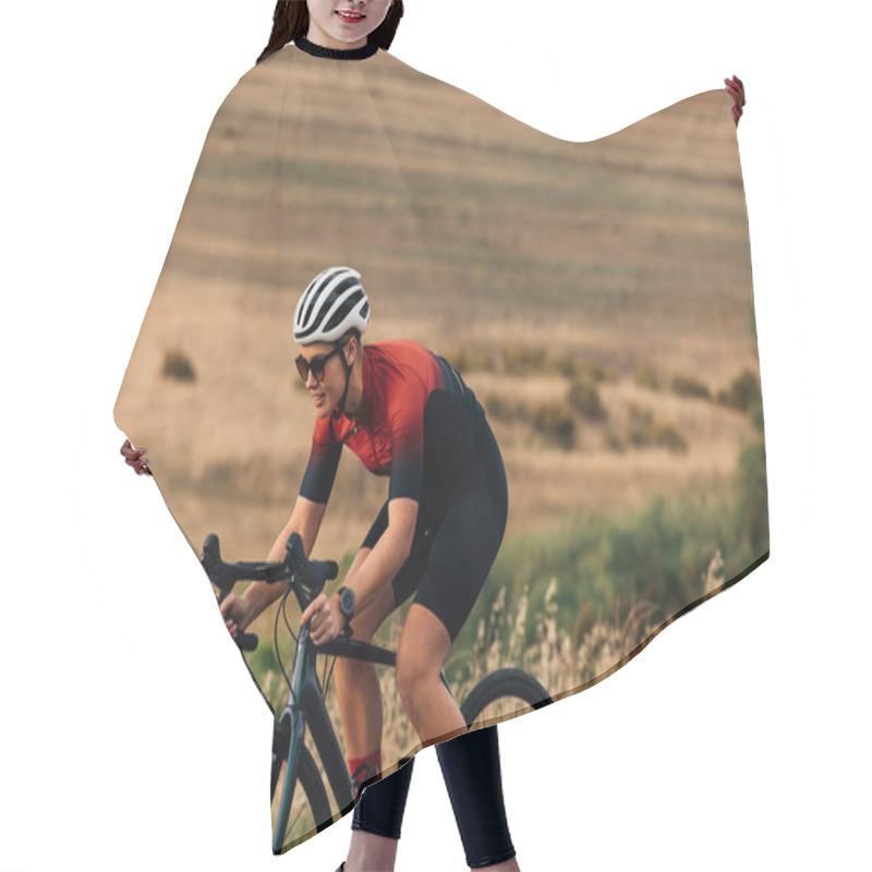 Personality  Sportswoman Riding A Bicycle On A Country Road. Professional Cyclist Practicing Outdoors. Hair Cutting Cape