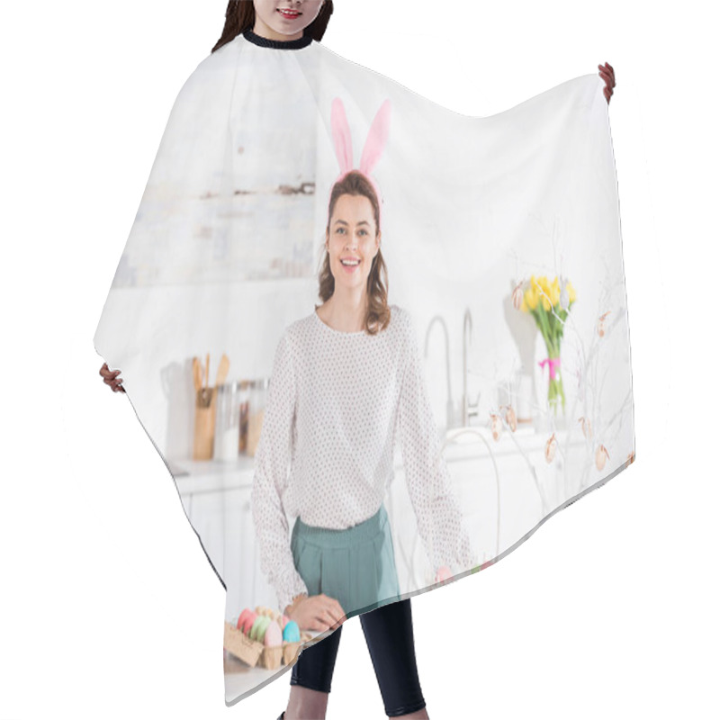 Personality  Smiling Woman In Bunny Ears With Painted Easter Egg In Kitchen Hair Cutting Cape