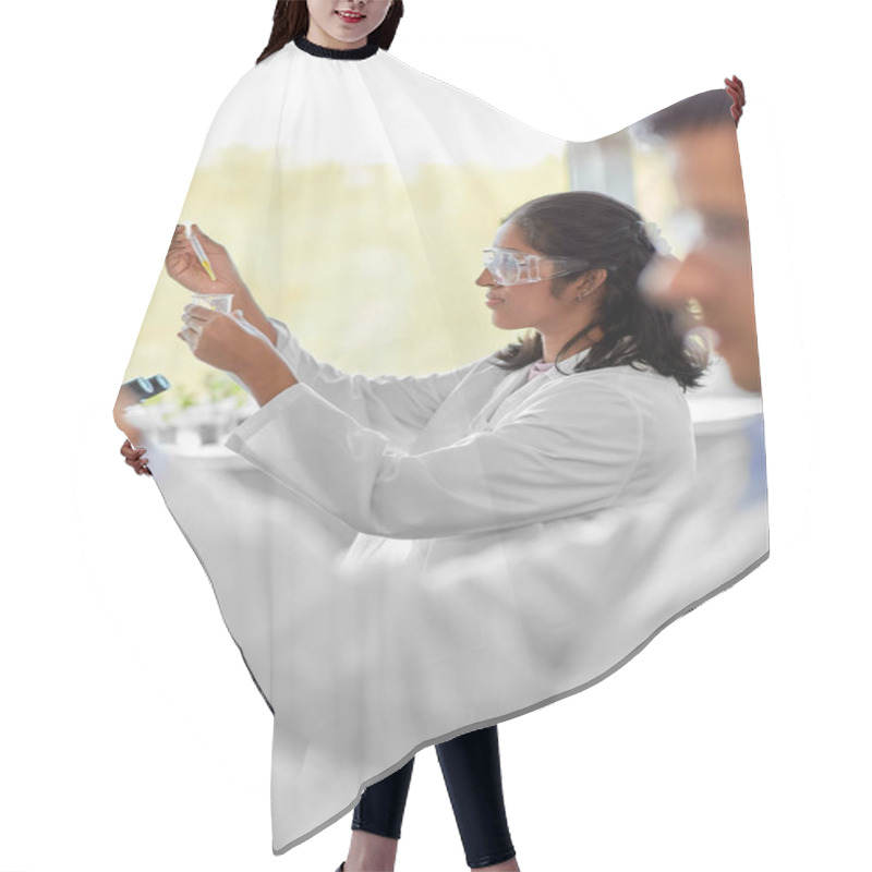 Personality  Science Research, Work And People Concept - Female Scientist With Chemical Or Test Sample In Beaker And Dropper Working In Laboratory Hair Cutting Cape