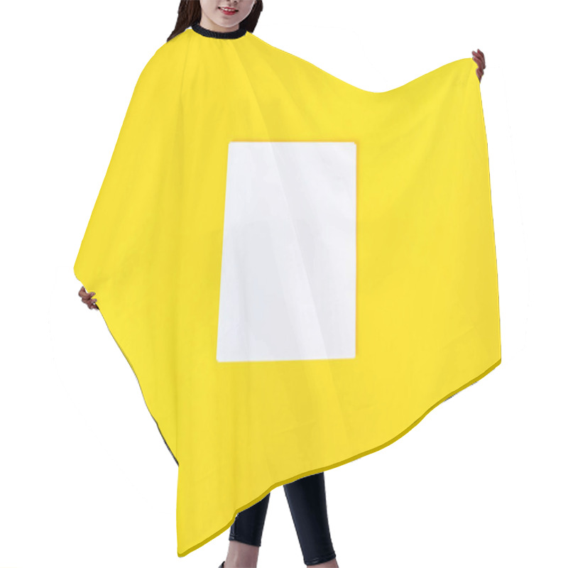 Personality  Empty White Paper On A Yellow Background, As Mockup For Your Design. Minimal Composition In Flat Lay Style.  Hair Cutting Cape