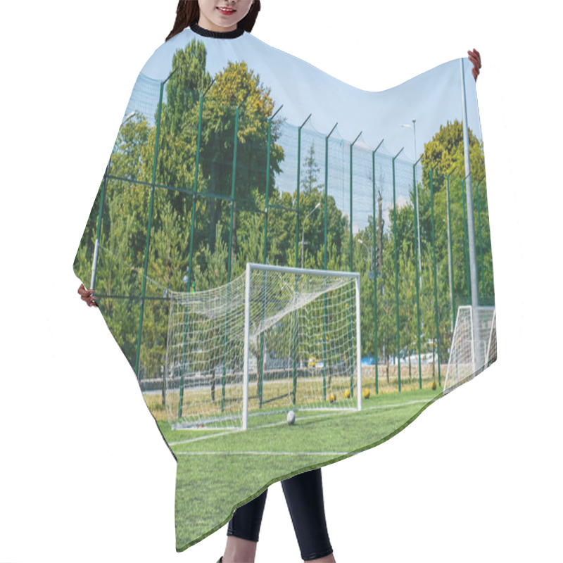 Personality  Football Goal At The Stadium. Metal Fence Wire In The Background. Hair Cutting Cape