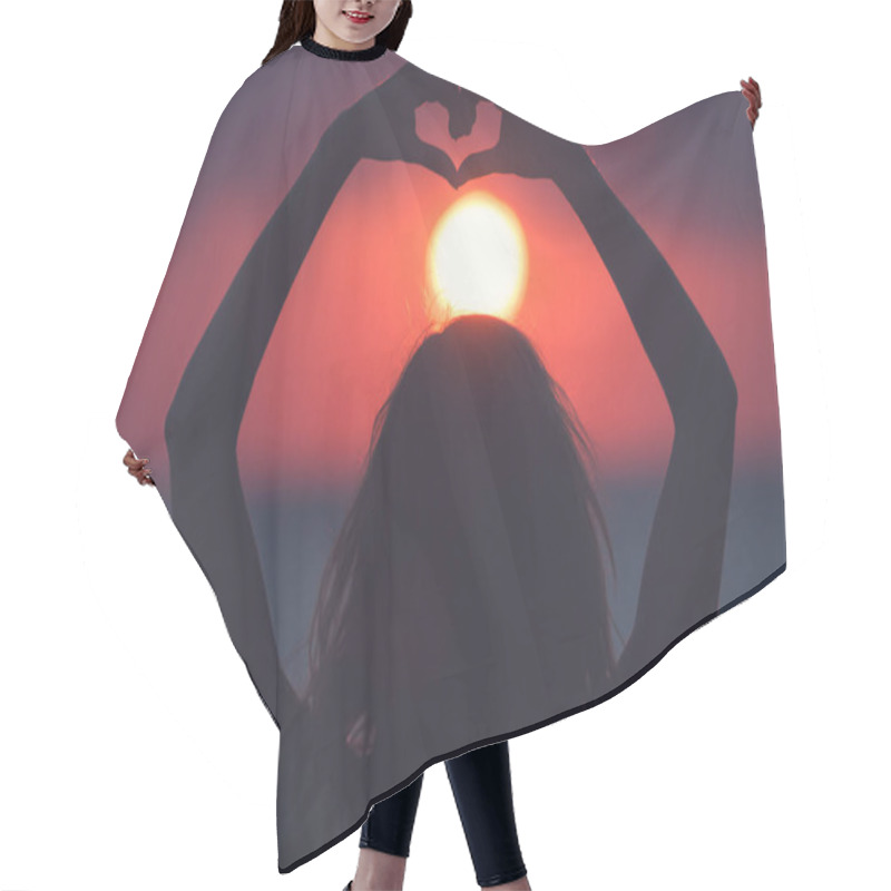 Personality  Girl Holding A Heart Shape For The Ocean / Sea Sunset. Hair Cutting Cape