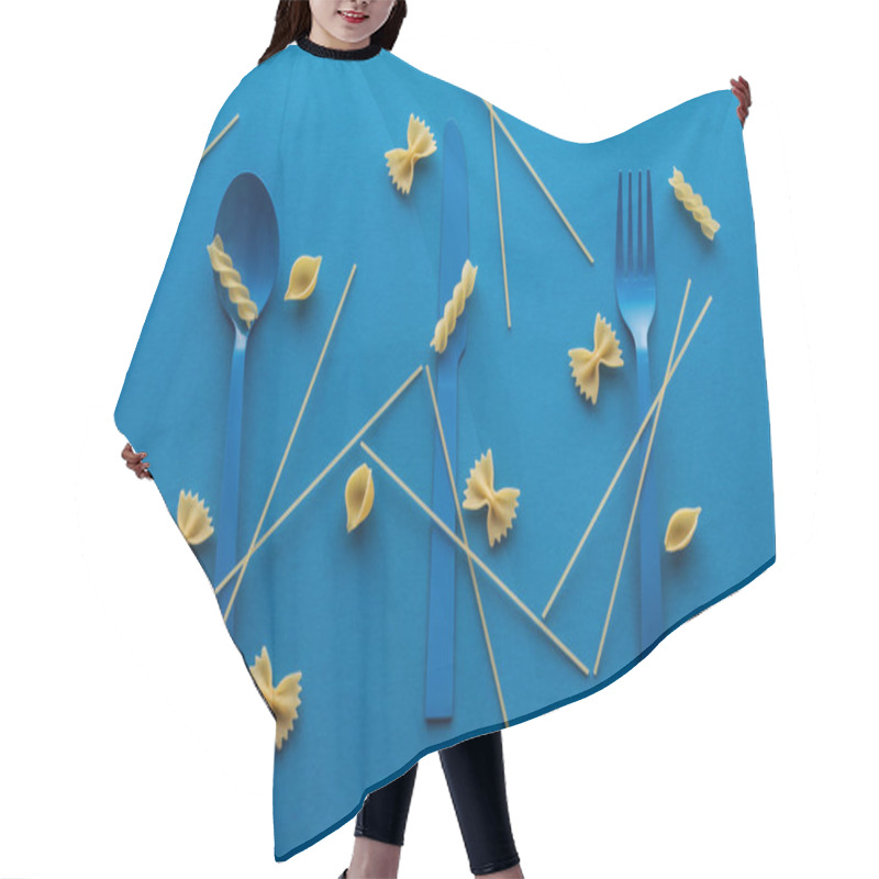 Personality  Blue Plastic Cutlery With Uncooked Spaghetti Around And Different Kinds Of Pasta On Blue Background Hair Cutting Cape