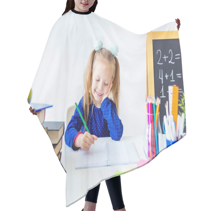 Personality  Happy Cute Industrious Child Is Sitting At A Desk Indoors Hair Cutting Cape