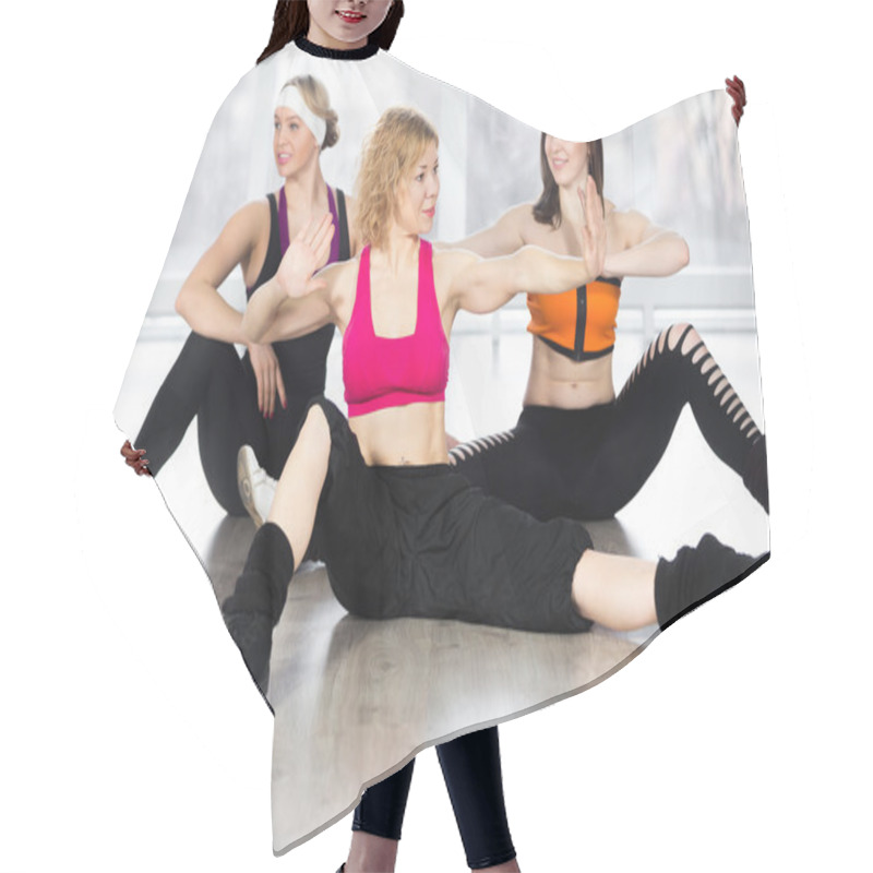 Personality  Group Of Three Females Doing Dynamic Fitness Exercises In Class Hair Cutting Cape