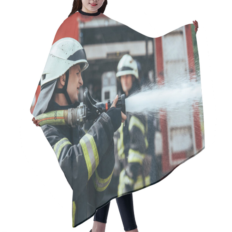 Personality  Selective Focus Of Firefighter With Water Hose Extinguishing Fire On Street Hair Cutting Cape