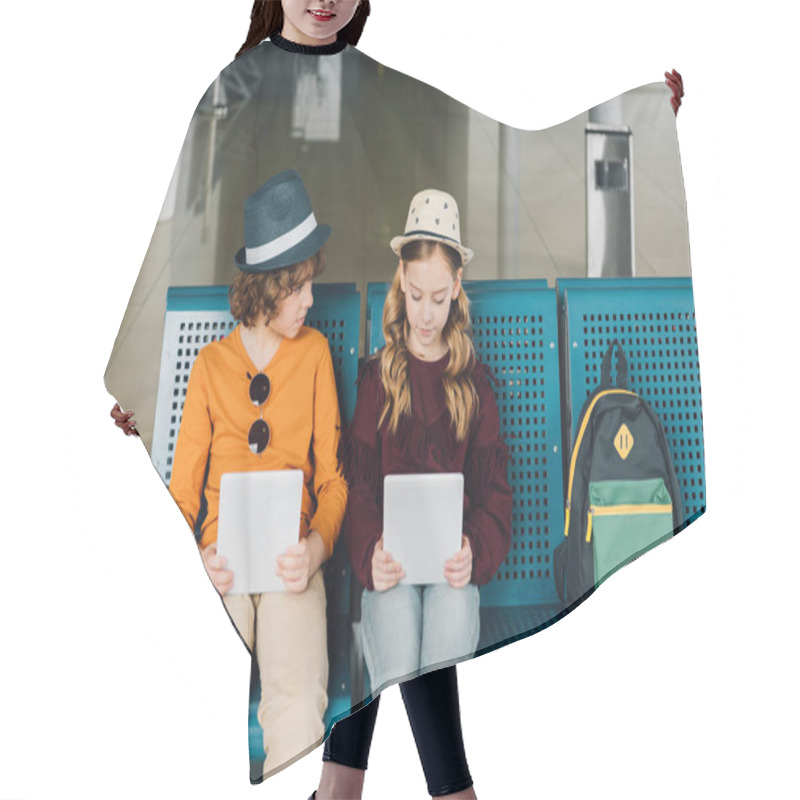 Personality  Cute Preteen Kids Sitting In Waiting Hall And Using Digital Tablets Hair Cutting Cape