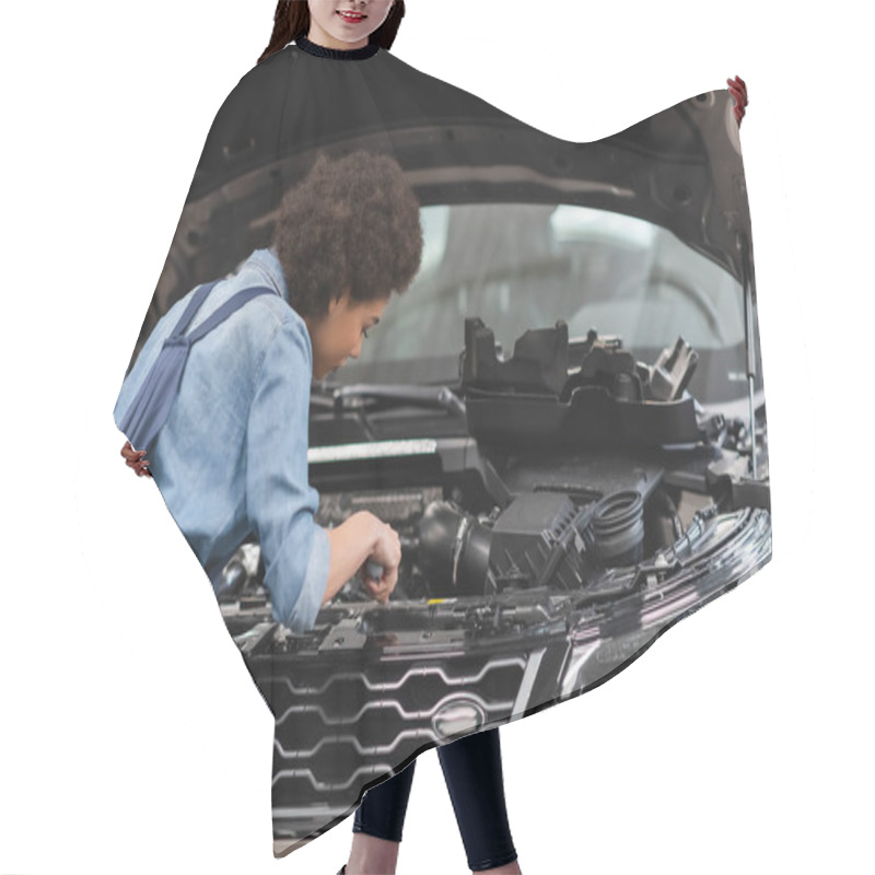 Personality  Young African American Mechanic Working With Motor Of Car With Open Hood In Garage Hair Cutting Cape