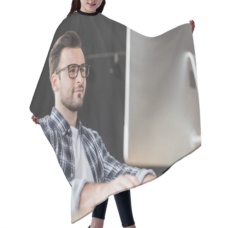 Personality  Smiling Young Man In Eyeglasses Using Desktop Computer At Workplace Hair Cutting Cape