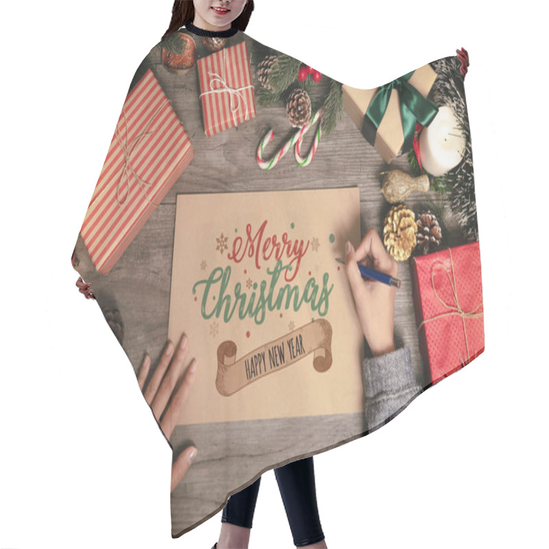 Personality  Hand Writing Greeting Card Merry Christmas Text With Christmas Decoration On Wood Table. Hair Cutting Cape