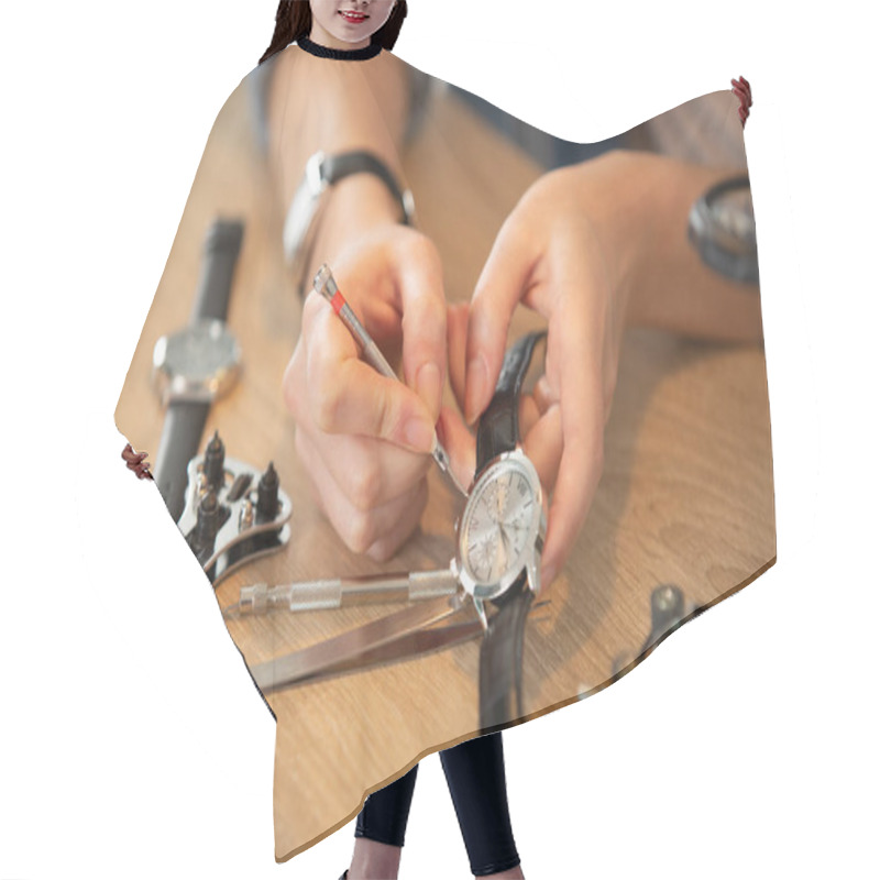 Personality  Cropped Image Of A Watch Being Repaired Hair Cutting Cape