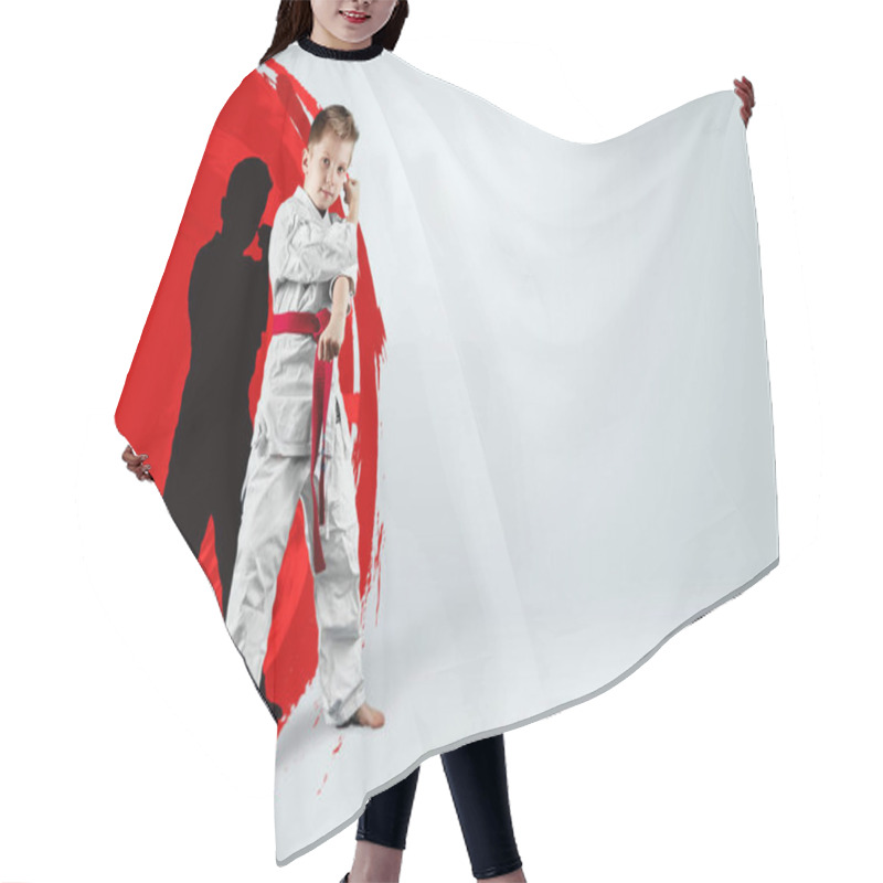 Personality  A Boy In A White Kimono With A Red Belt Against The Background Of A Red Circle, The Sun. Karate Concept, Goal, Training, Achievement Hair Cutting Cape