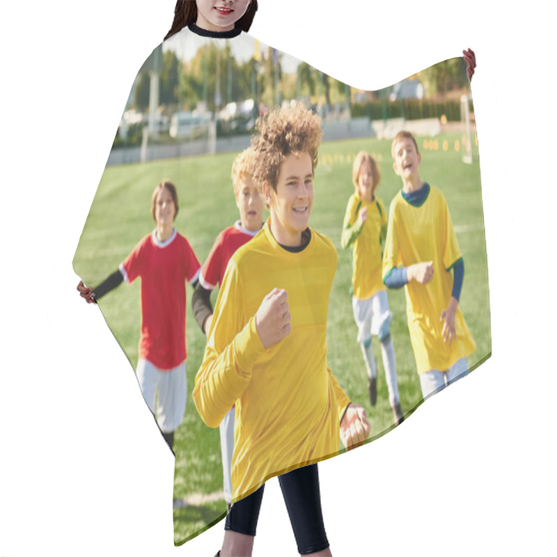 Personality  A Lively Group Of Young Boys Joyfully Running Around A Soccer Field, Kicking The Ball, Laughing, And Chasing Each Other In Friendly Competition. Hair Cutting Cape