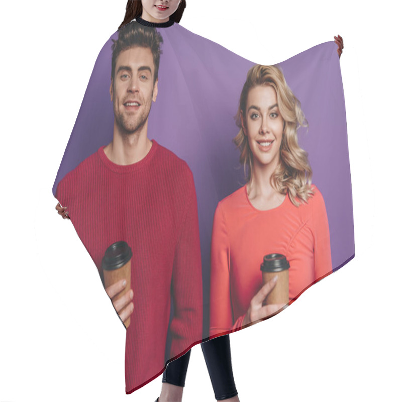 Personality  Smiling Couple Looking At Camera While Holding Coffee To Go On Purple Background Hair Cutting Cape