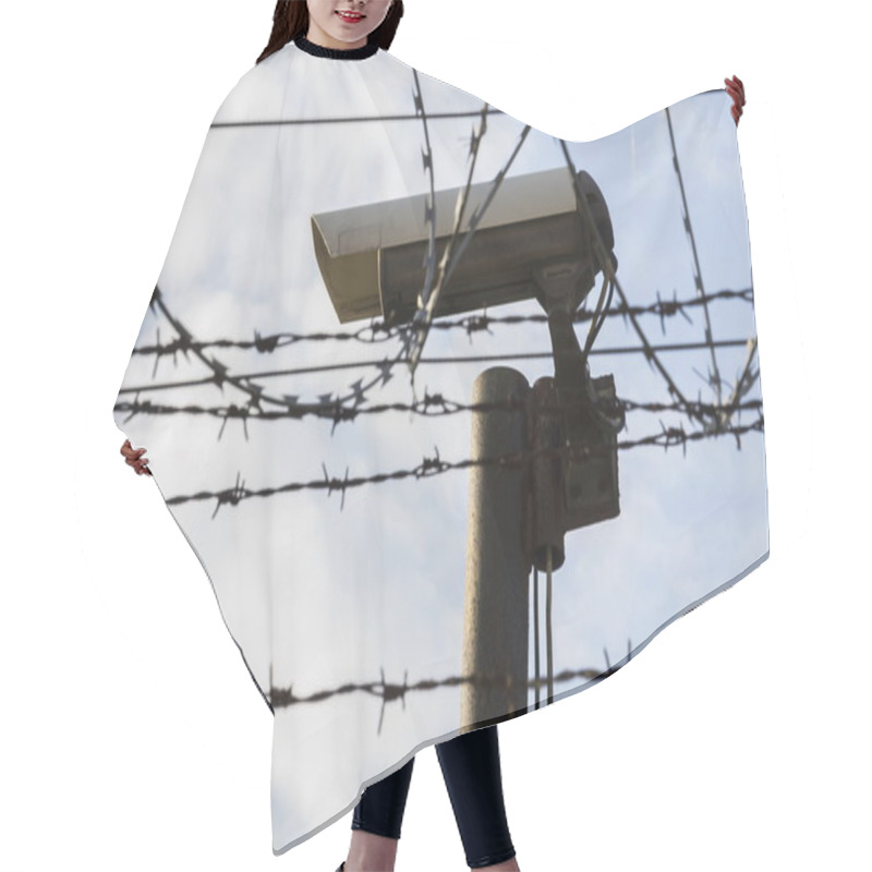 Personality  Security Camera Behind Barbed Wire Fence Around Prison Walls Hair Cutting Cape