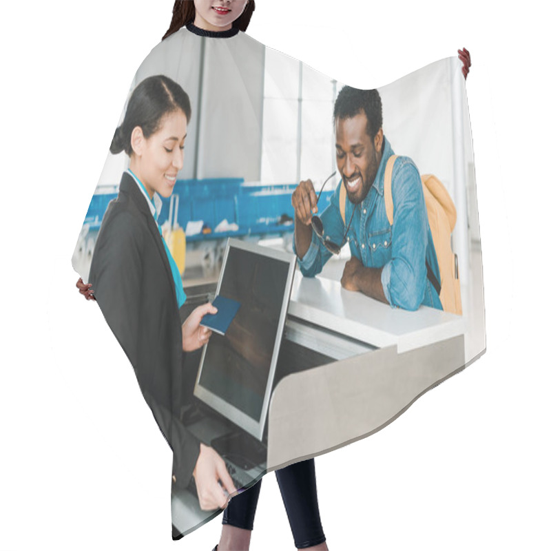 Personality  Smiling African American Airport Worker Checking Air Ticket And Passport At Ticket Control In Airport Hair Cutting Cape