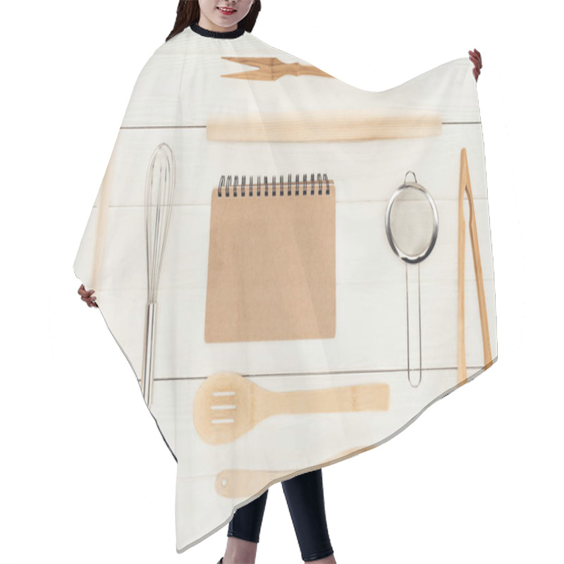 Personality  Top View Of Textbook And Kitchen Utensils On Wooden White Table   Hair Cutting Cape