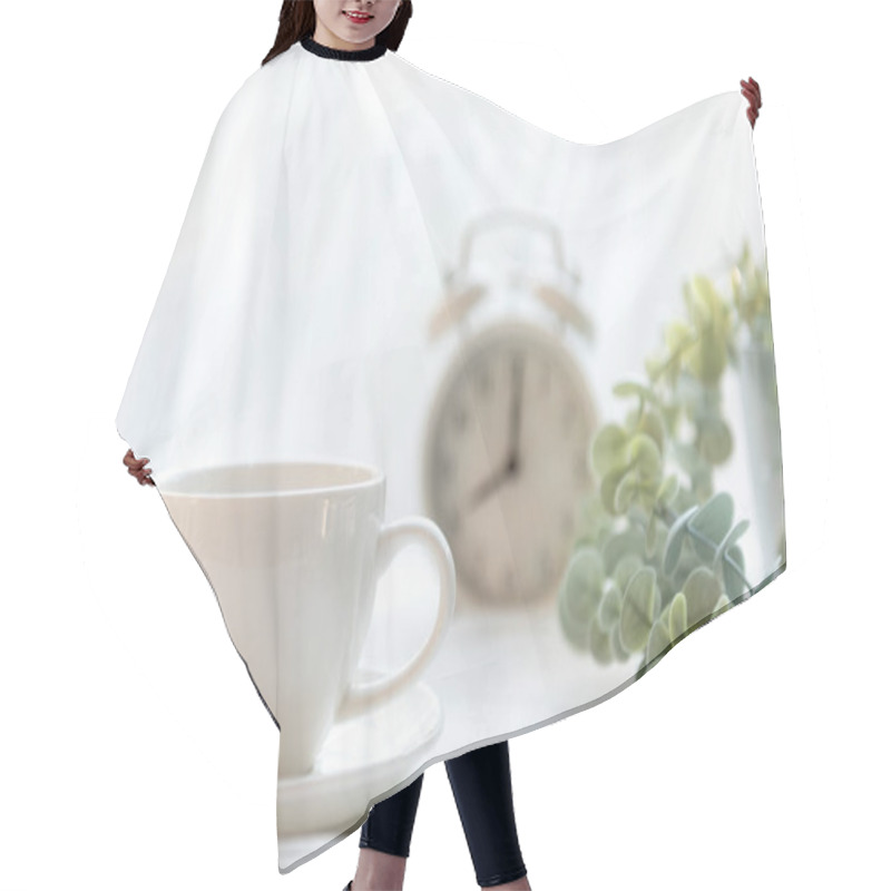 Personality  Select Focus.  Coffee Morning.  White Steaming Cup Of Hot Coffee For Relax After Wake Up, Vintage Alarm Clock Background. Lifestyle Concept Hair Cutting Cape