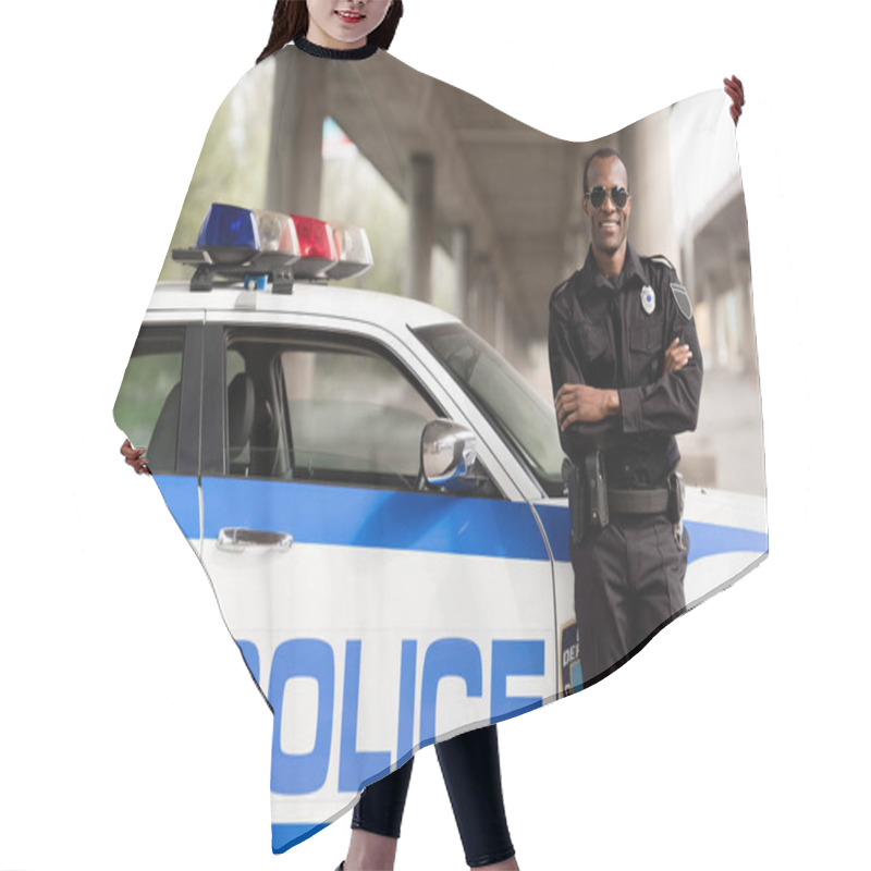 Personality  Handsome African American Police Officer With Crossed Arms Leaning Back On Car And Looking At Camera Hair Cutting Cape