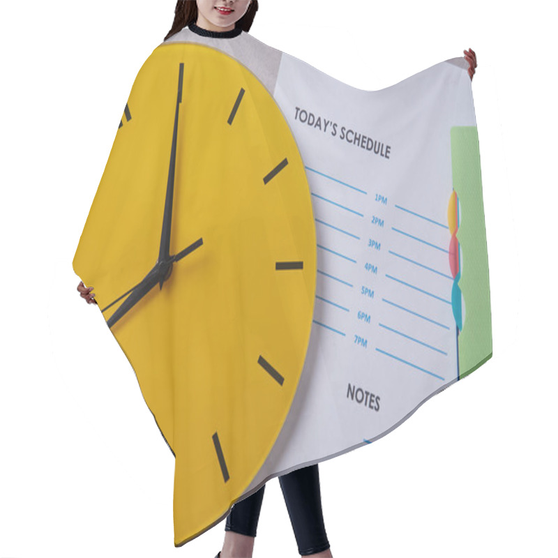 Personality  Time Management Deadline And Schedule Concept: Yellow Clock On The Background Of The Schedule Hair Cutting Cape